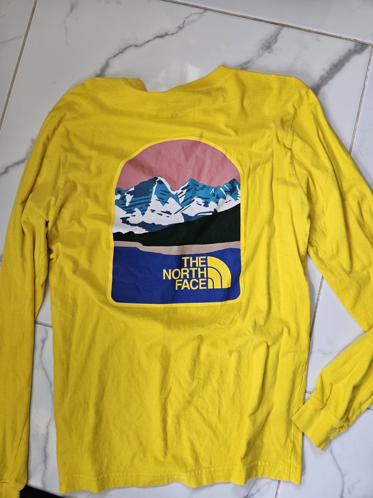 The North Face parks long sleeve shirt.