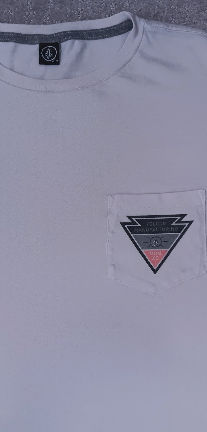 Volcom Manufacturing Front Pocket T Shirt _ Size XL_ discoloration as shown