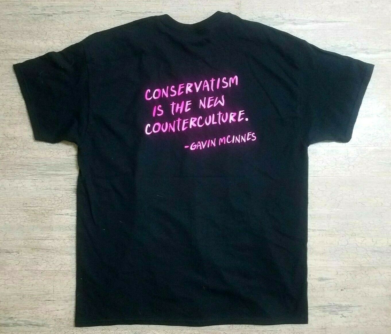 Banned Galvin Mcinnes T-Shirt Size XL Black with Pink Writing. Quote on back.