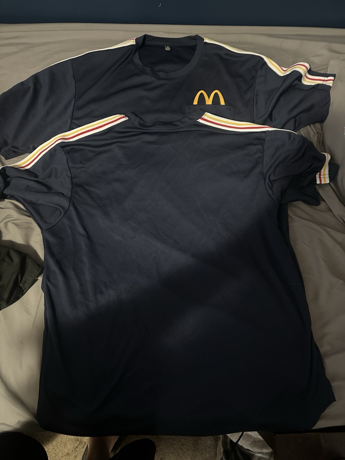 Various McDonalds employee shirts