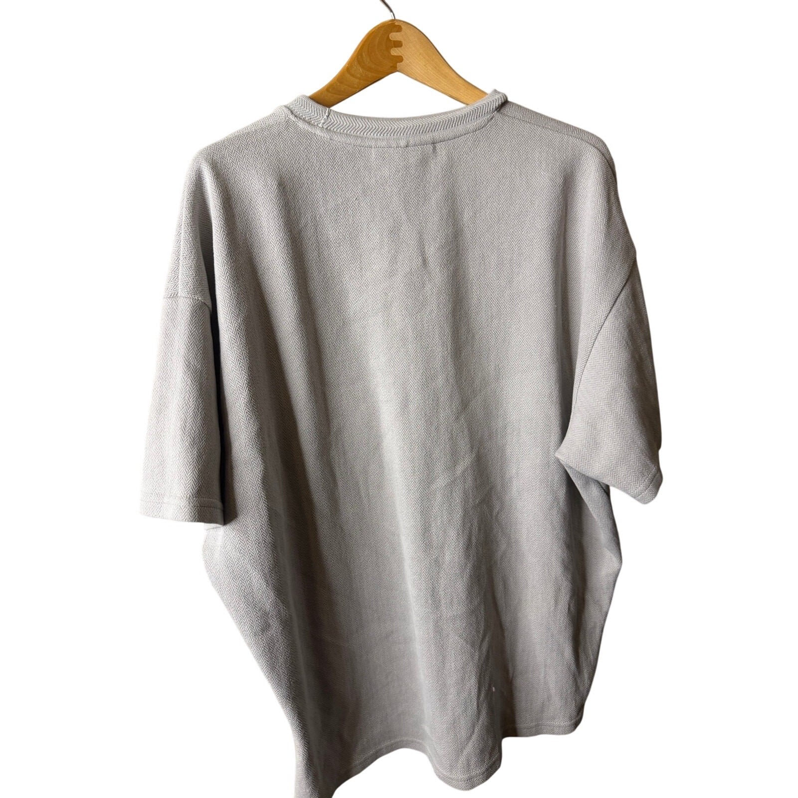 I Love Ugly oversized t-shirt with a textured herringbone pattern.