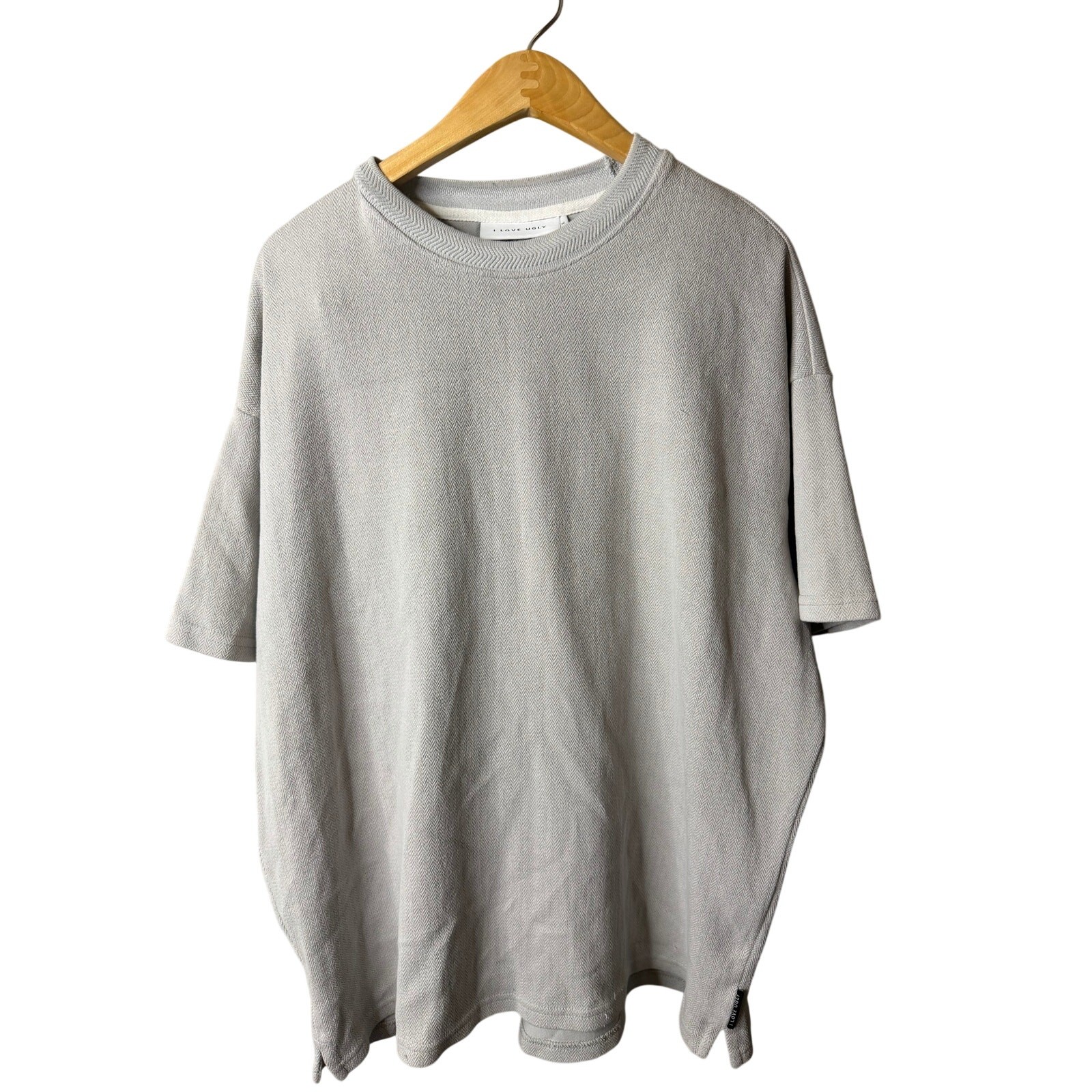 I Love Ugly oversized t-shirt with a textured herringbone pattern.