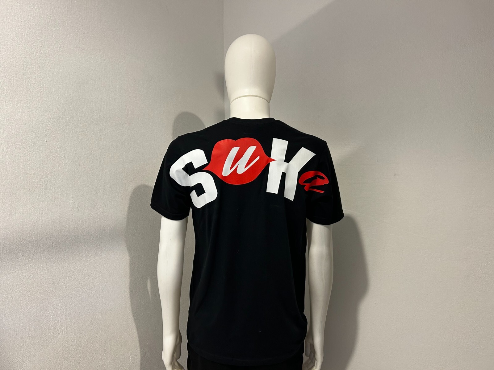 Unisex Short Sleeve T-Shirt, White or Black, Brand “Suka” With Logo Back