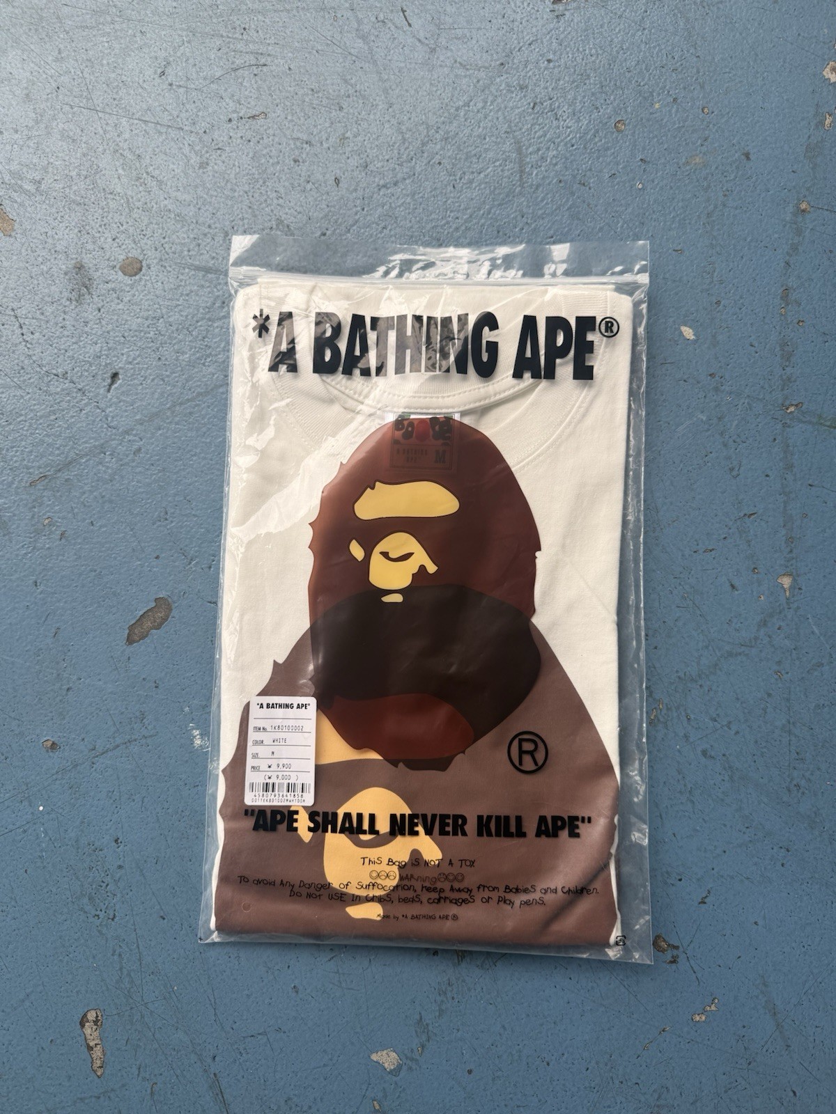 A Bathing Ape BAPE Men’s Size M White Ape Head Graphic Logo Crew Neck Tee