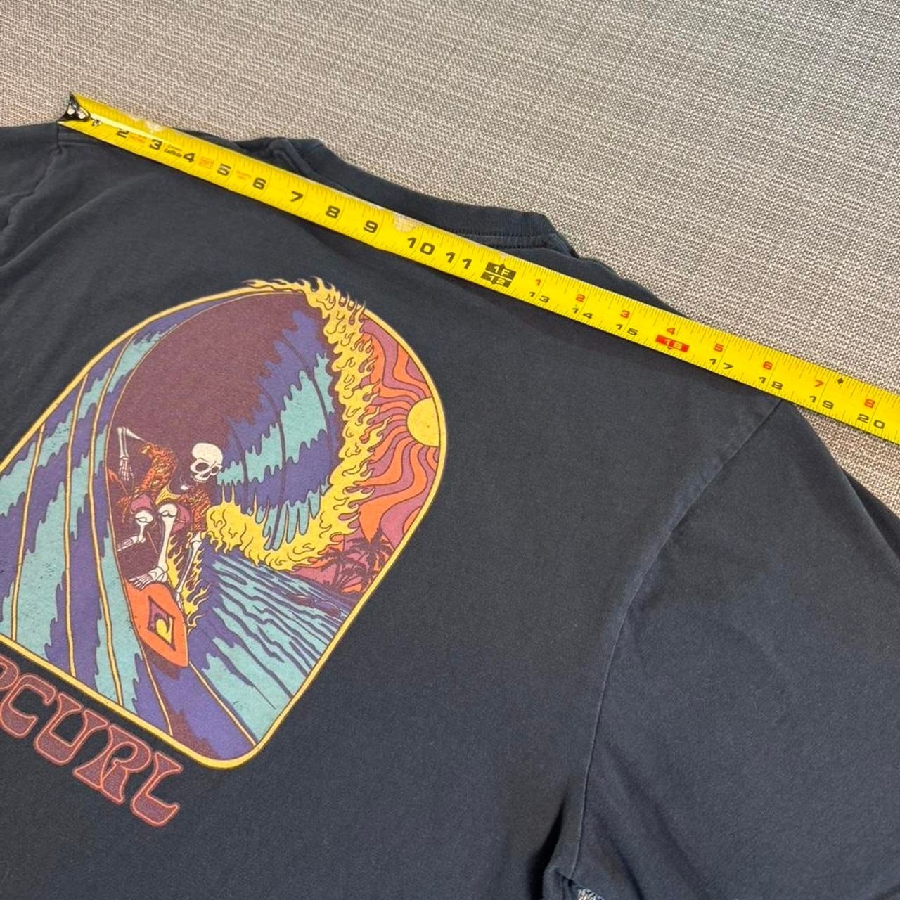 Rip Curl navy/black surf tee.