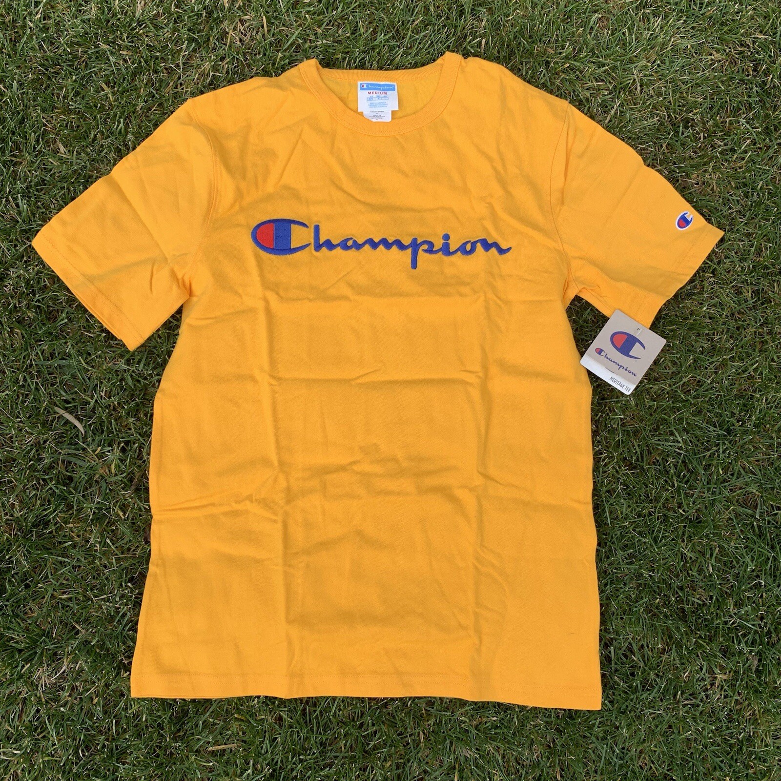 Champion T-Shirt Script Logo Embroidered Spell Out | Yellow — Men’s Size Medium