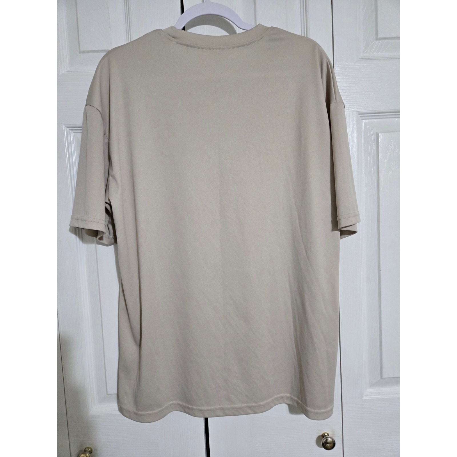 Unknown brand large men’s cream colored tshirt