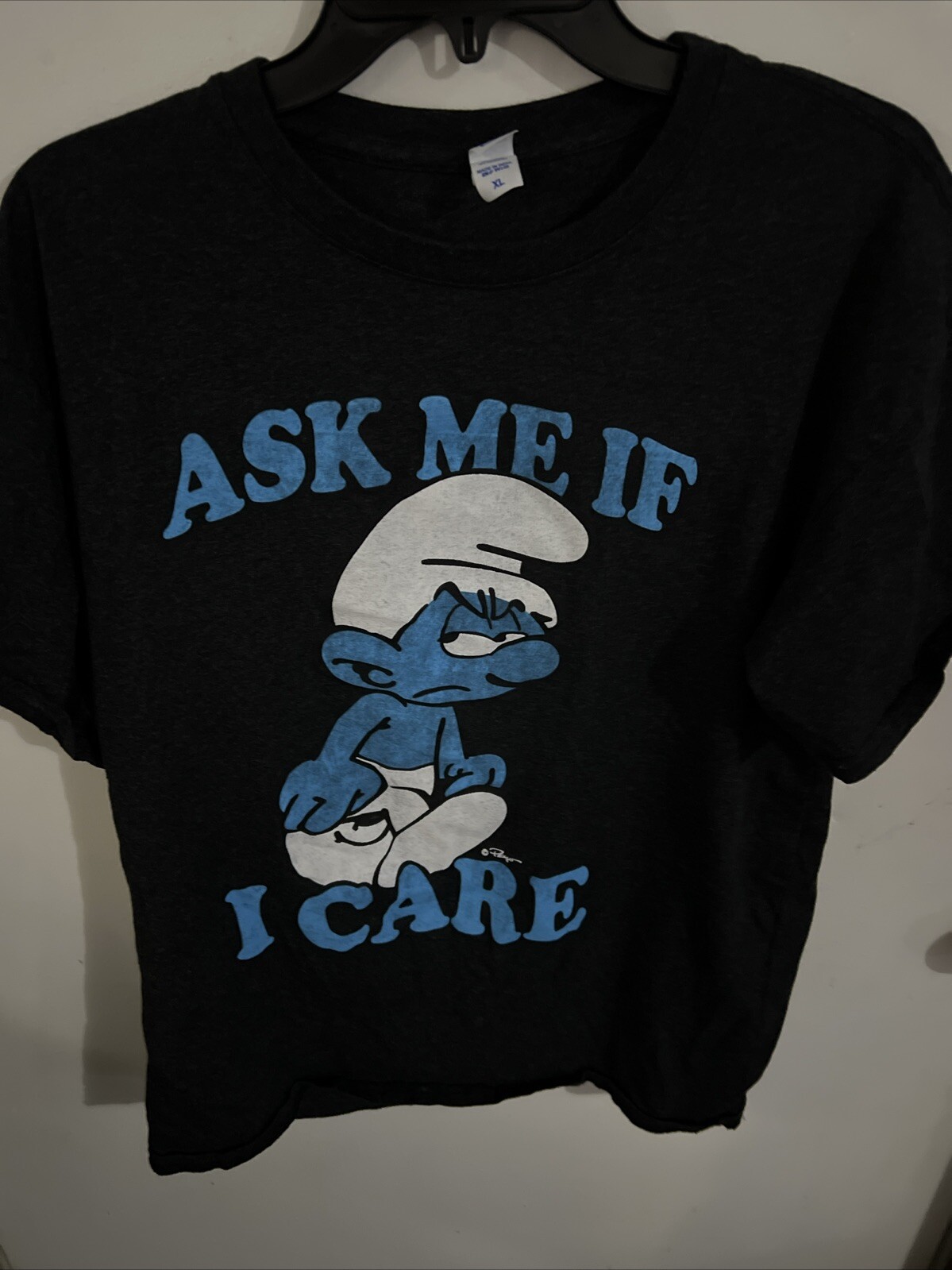 The Smurfs Men’s Brisco Brands Grumpy Smurf Ask Me If I Care T Shirt Size L