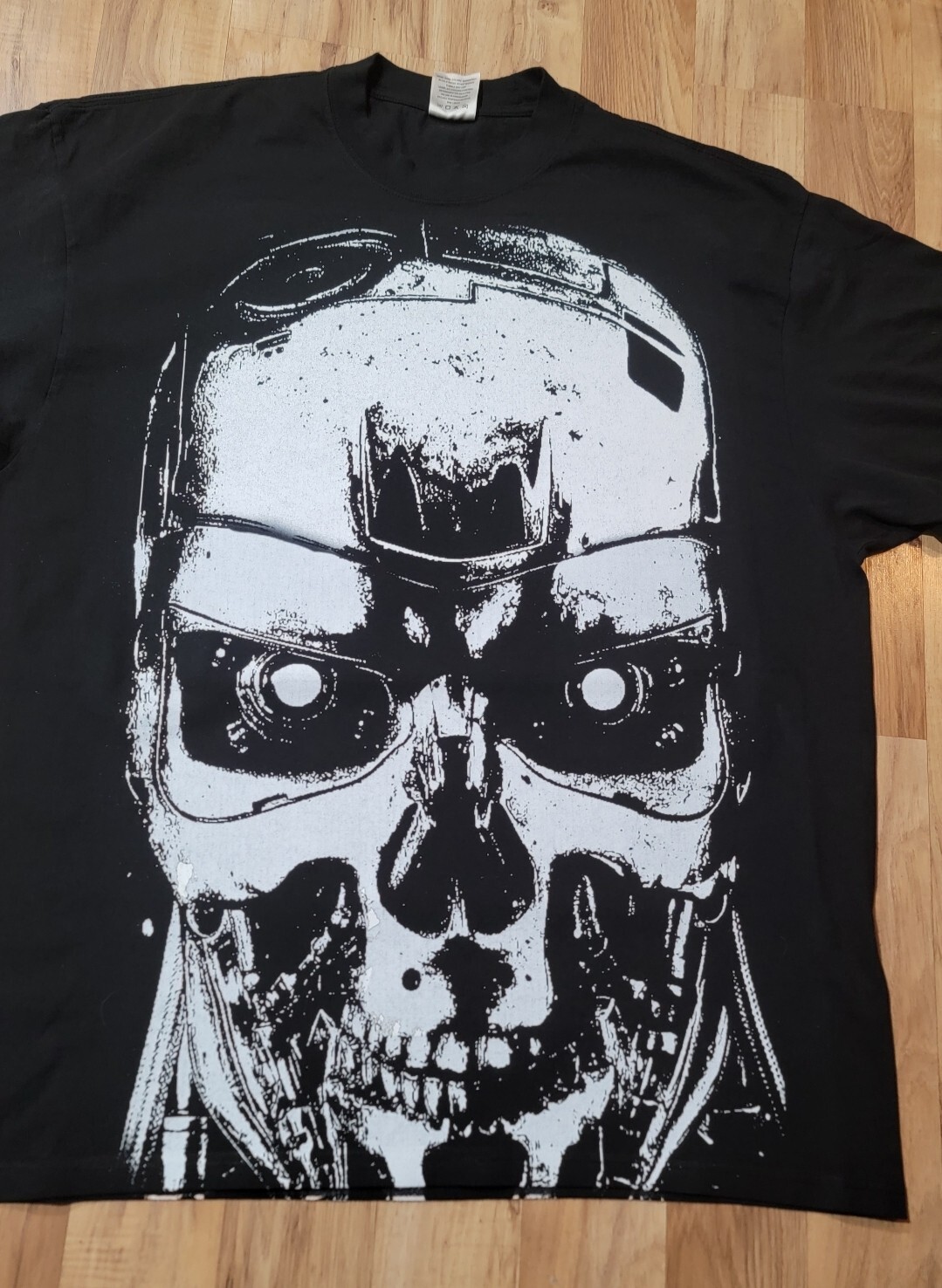 TERMINATOR JUMBO WHITE PRINT ON A SHAKA HEAVYWEIGHT GARMET DYED T SHIRT “MODERN”