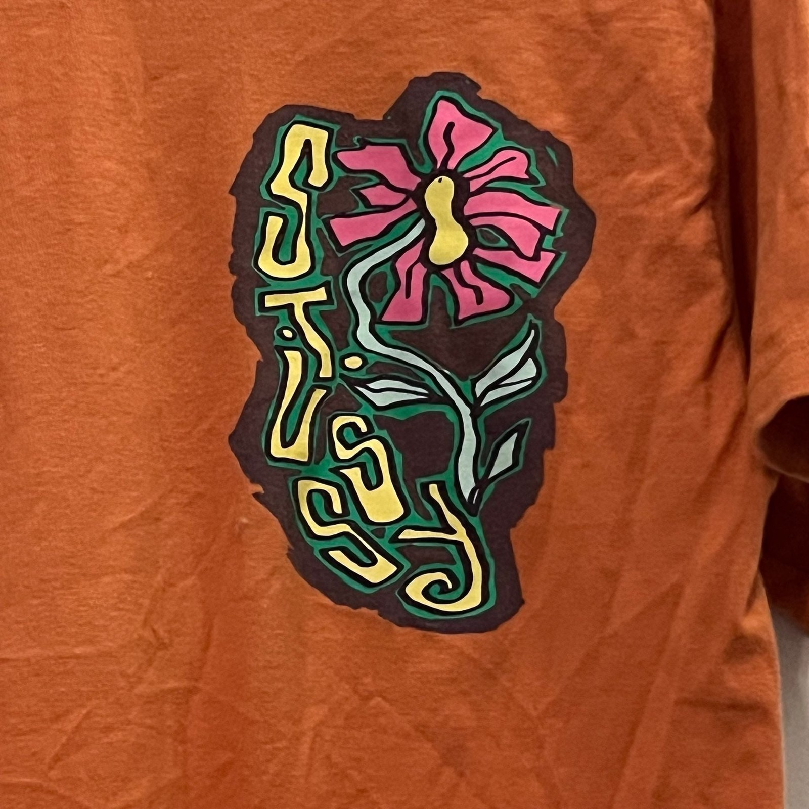 Stussy Flower Graphic Logo Crewneck T-Shirt in Orange