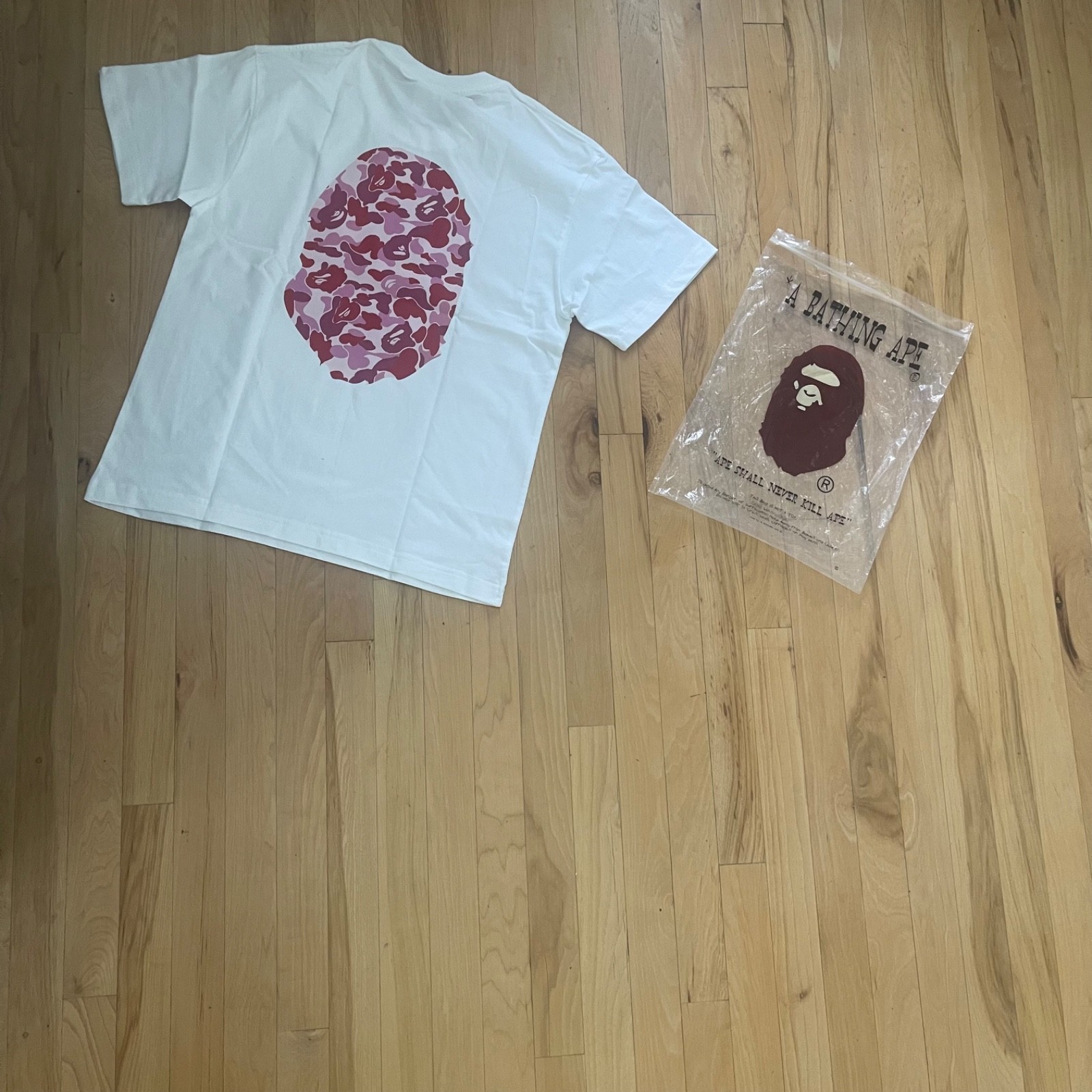 A Bathing Ape BAPE Men’s Small White Short Sleeve Crew Neck Ape Head Logo Tee