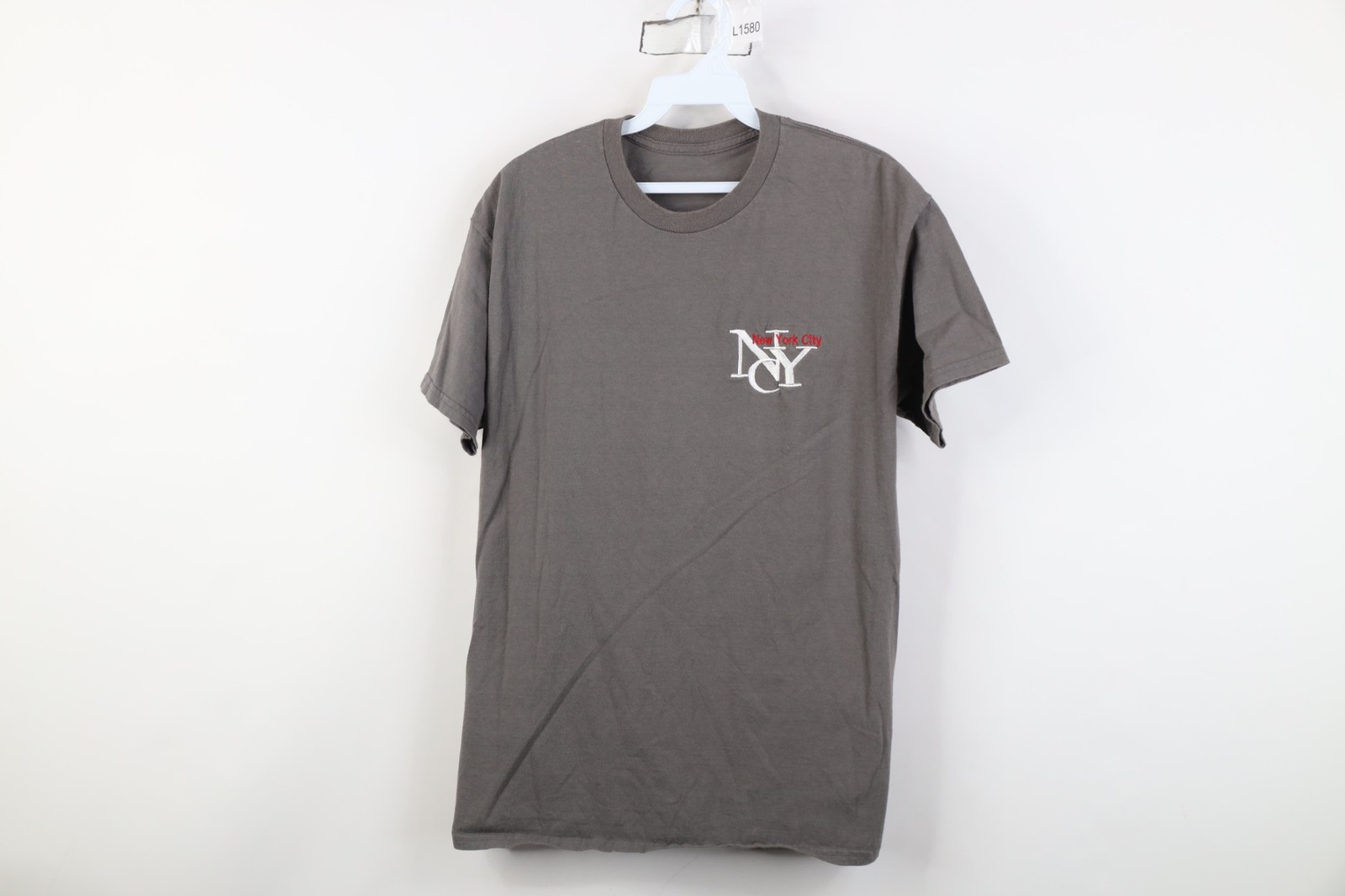Vintage 90s Streetwear Mens Small Faded Spell Out New York City NYC T-Shirt Gray