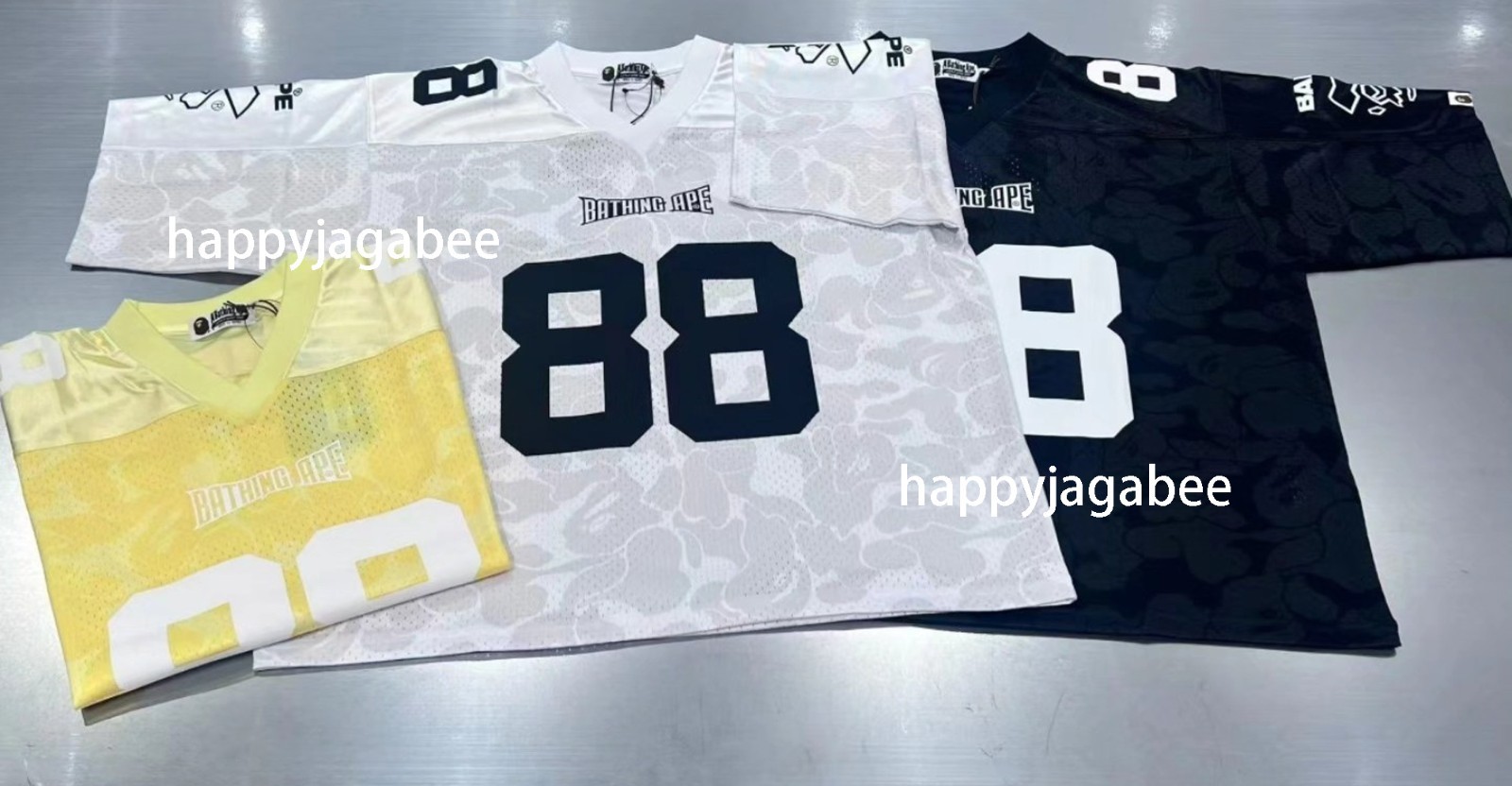 A BATHING APE Men’s SOLID CAMO MULTI LOGO RELAXED FIT FOOTBALL JERSEY TEE rz