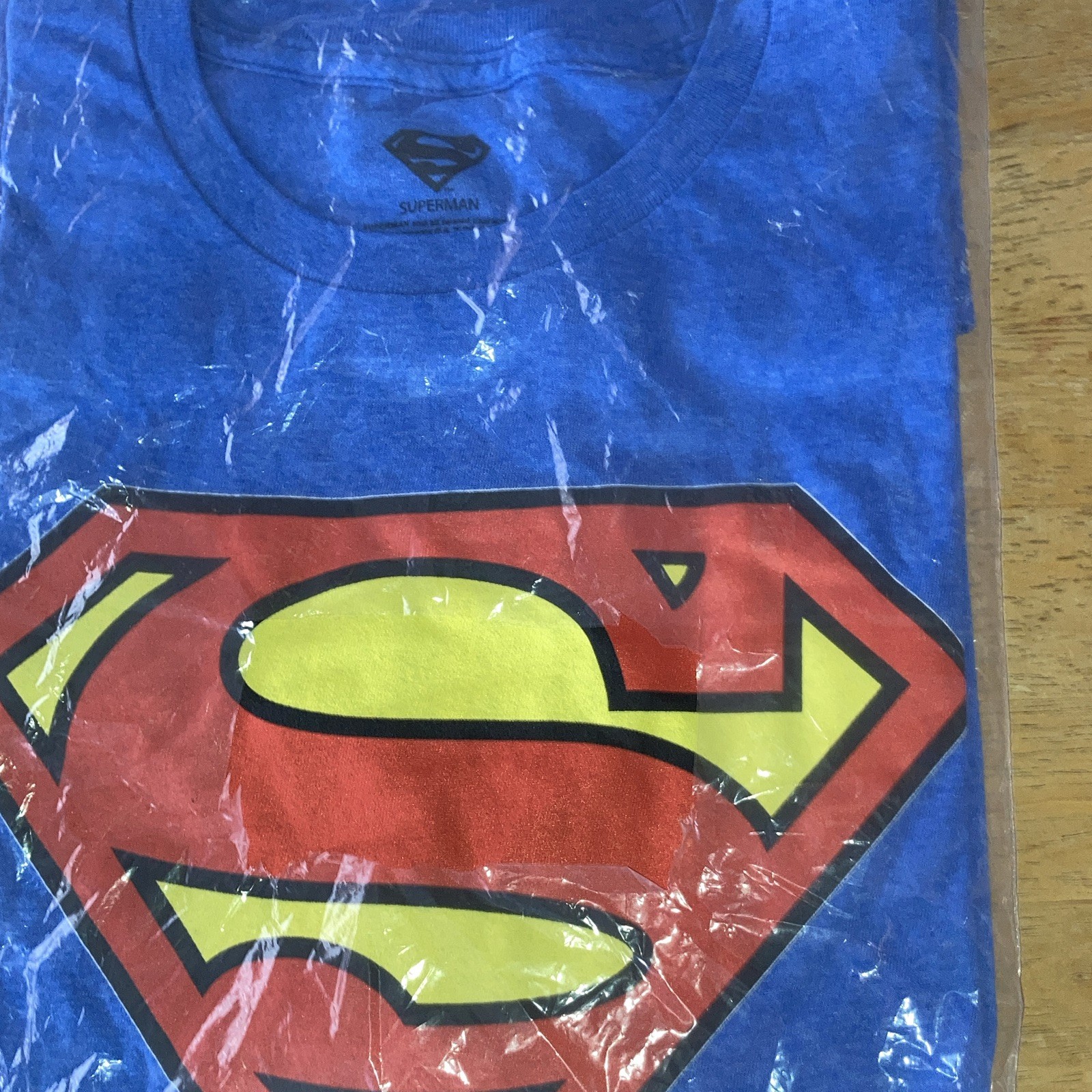 Superman Men’s L/G Blue Graphic Logo Crew Neck Short Sleeve Knit T-Shirt