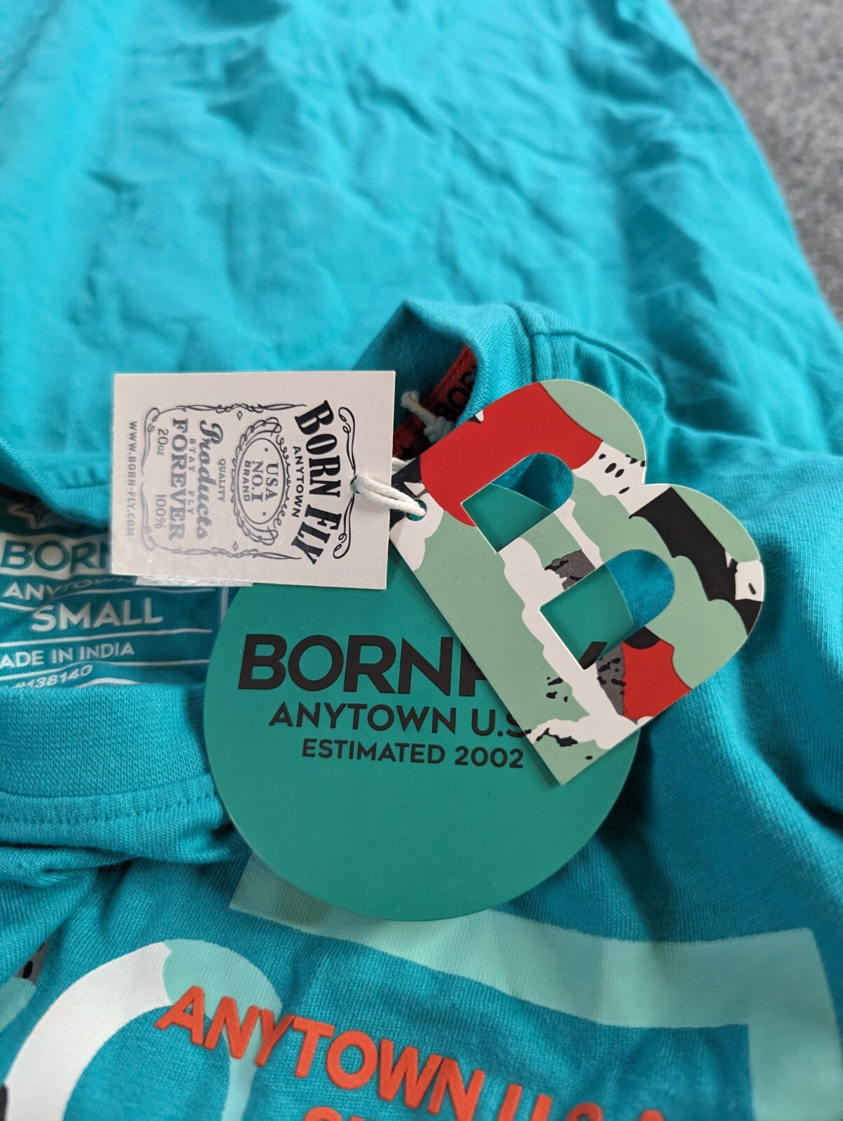 Born Fly T-shirt Mens Small Teal Anytown USA NWT
