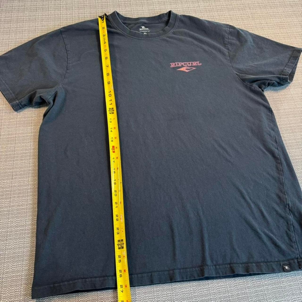 Rip Curl navy/black surf tee.