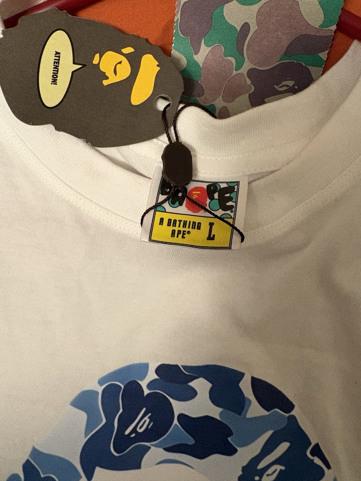BAPE white t-shirt with blue camouflage ape head graphic