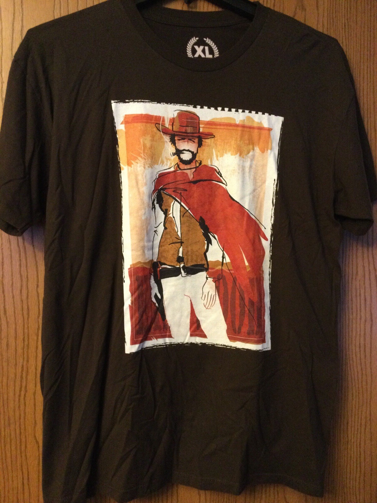 Cllnt Eastwood – “The Man With No Name” – Brown Shirt – XL – Tee Public