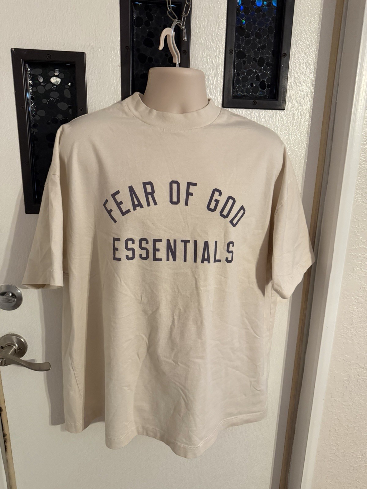 Fear of God Essentials oversized beige/tan graphic T-shirt front arch Logo Clean