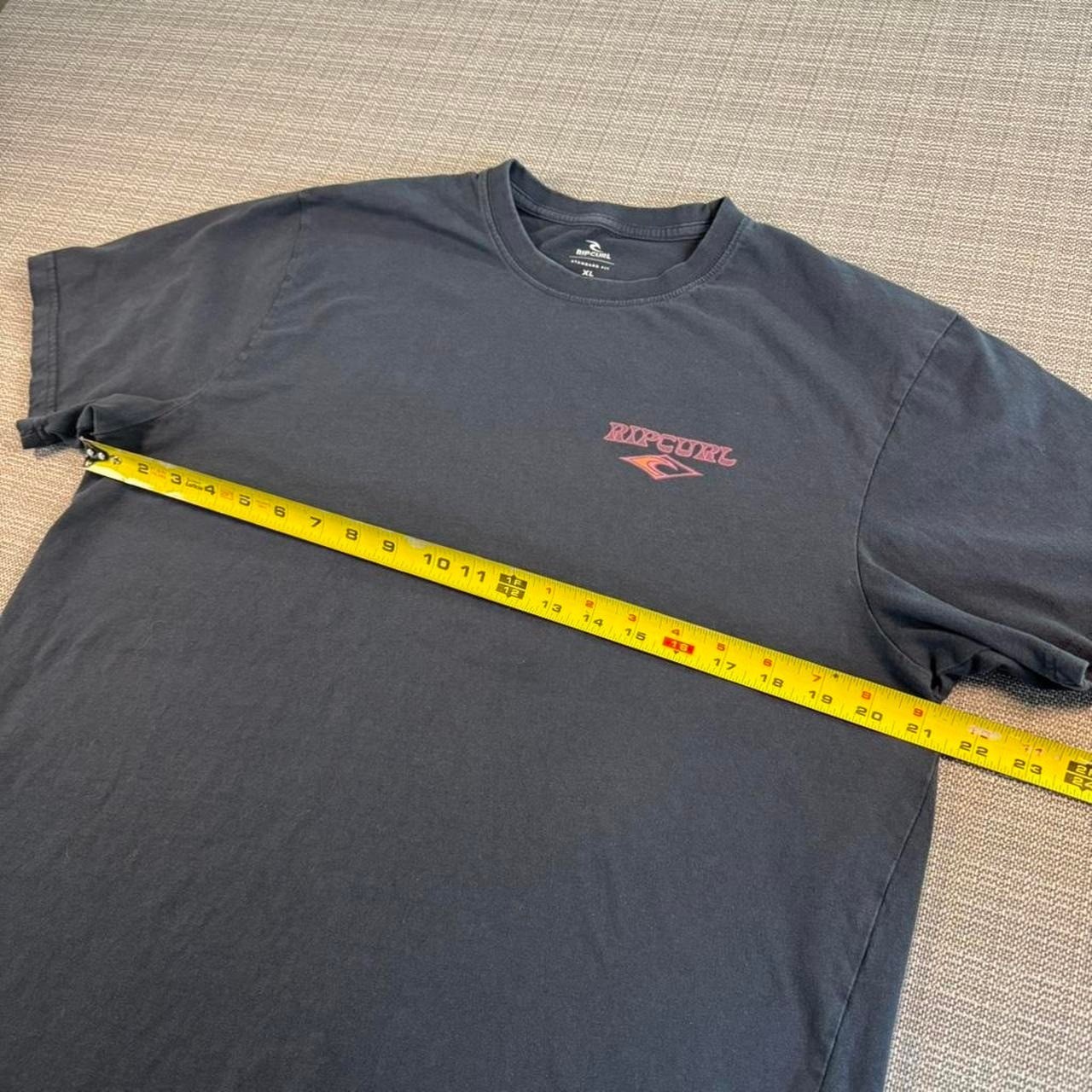 Rip Curl navy/black surf tee.