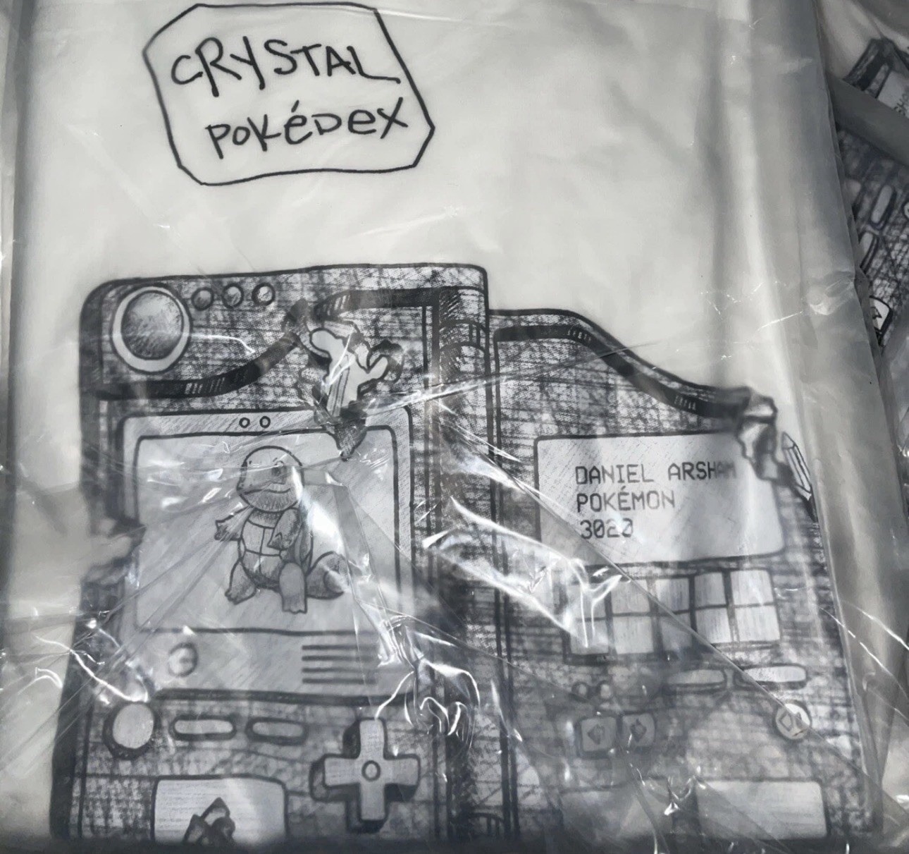 Uniqlo Men’s T-Shirt Daniel Arsham x Pokémon Crystal Pokedex White, MULTI SIZING