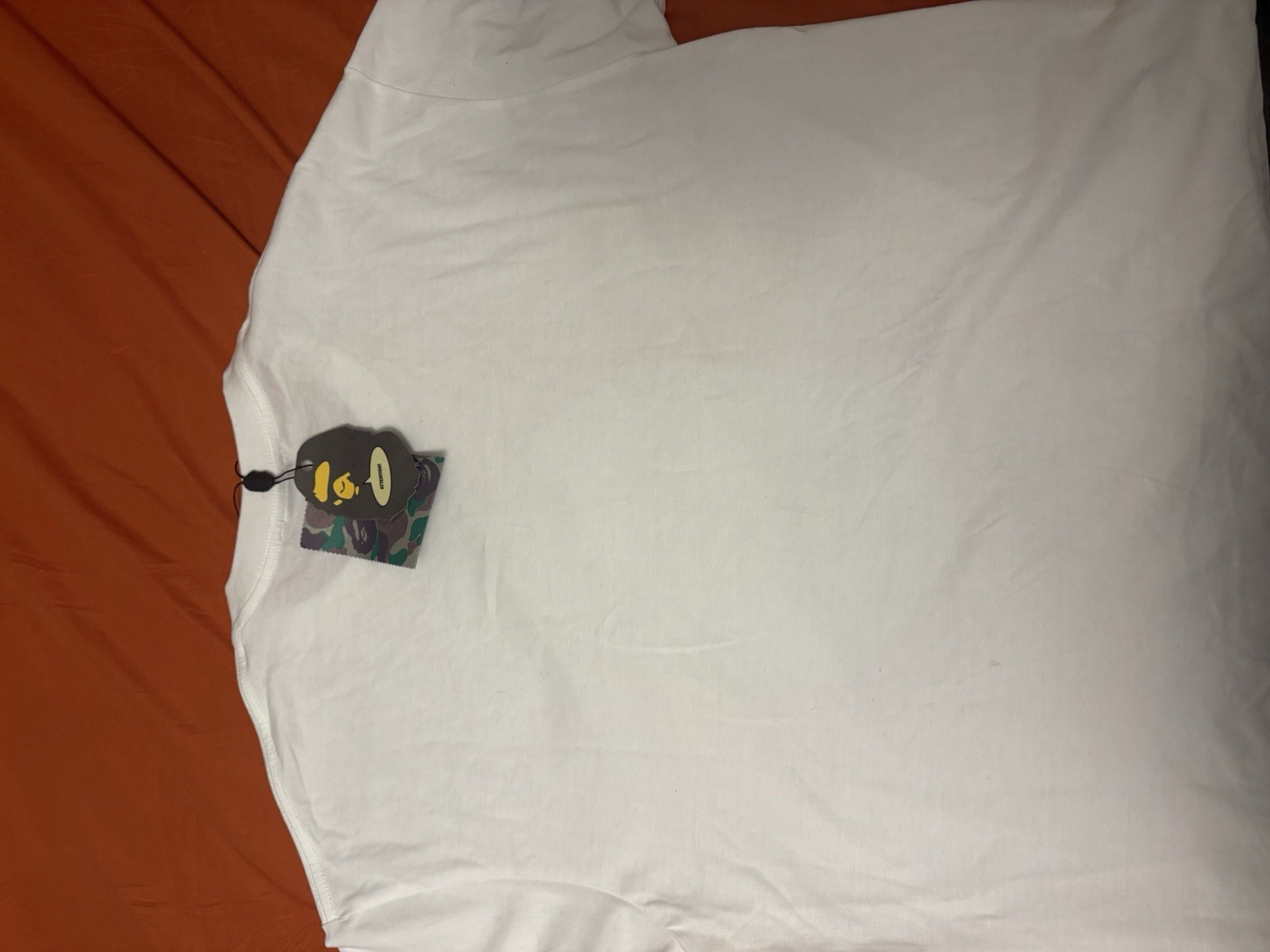 BAPE white t-shirt with blue camouflage ape head graphic