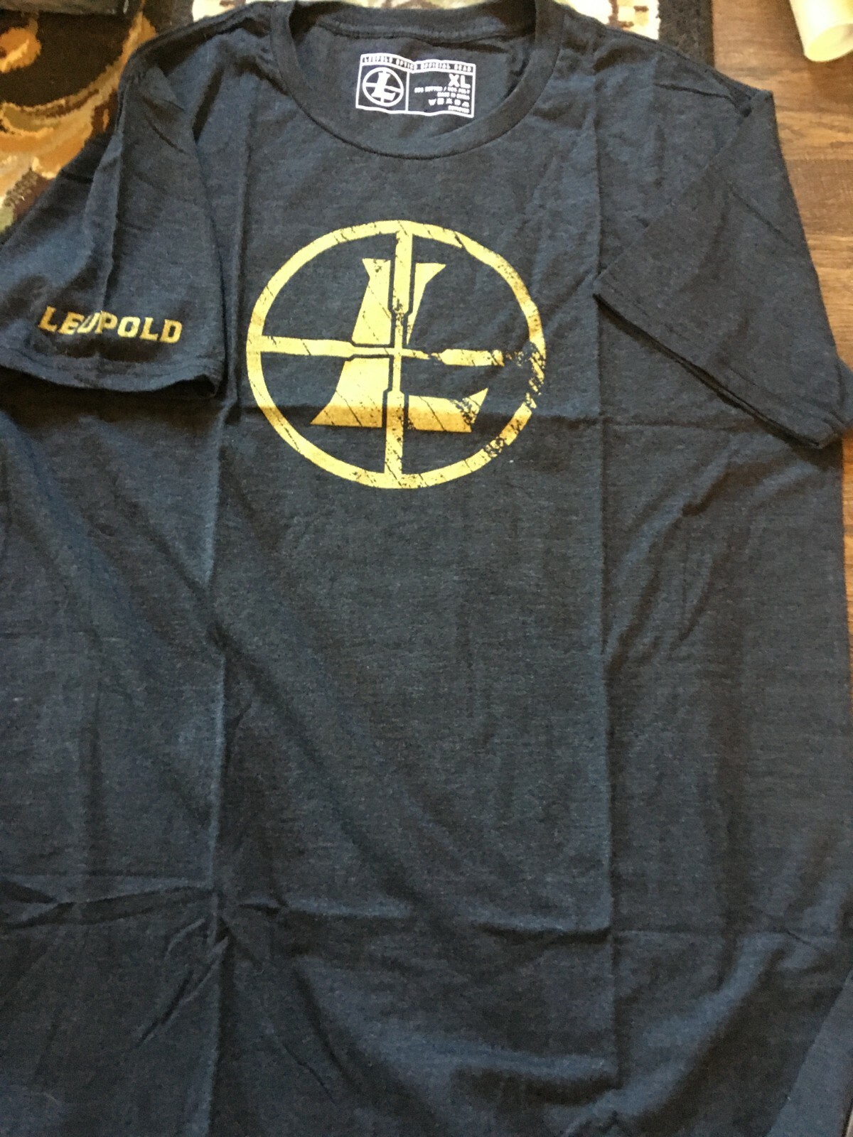 New Leupold Reticle T-Shirt Charcoal Heather With Gold Logo – Med, L, 3XL