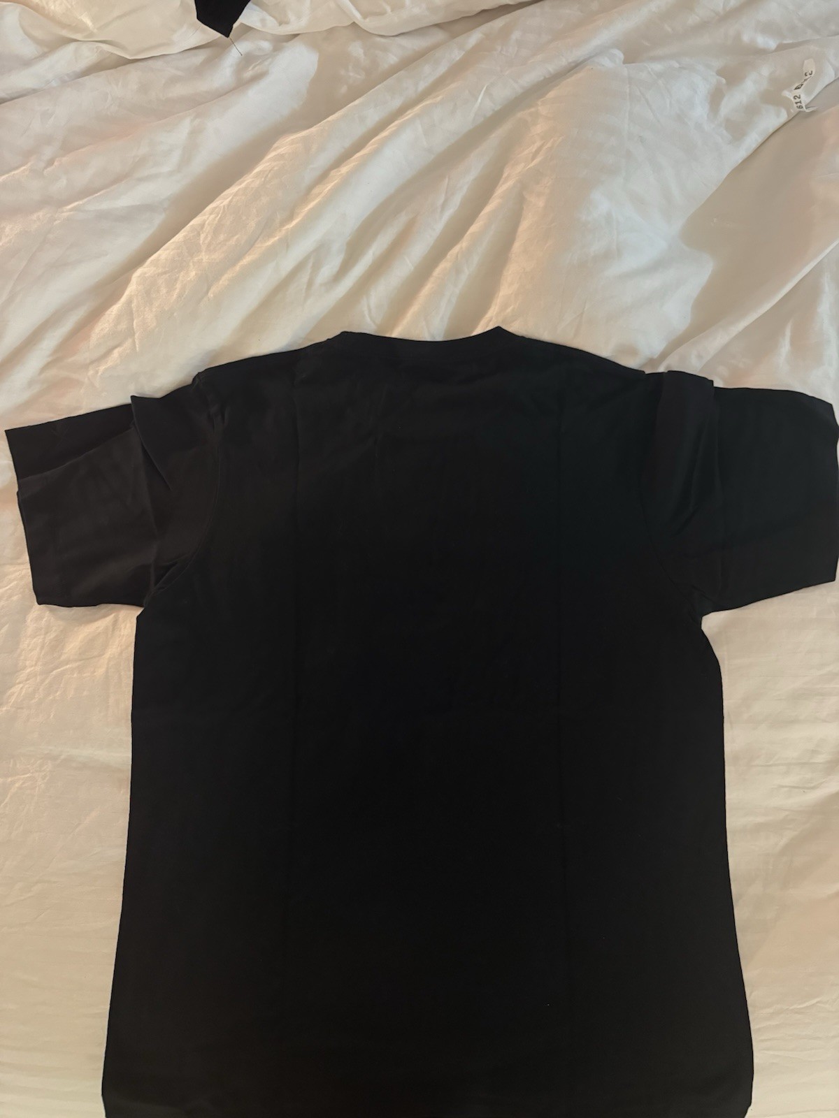 Uniqlo UT x KAWS Men’s Black Short Sleeve Crew Neck Pocket Graphic Tee M