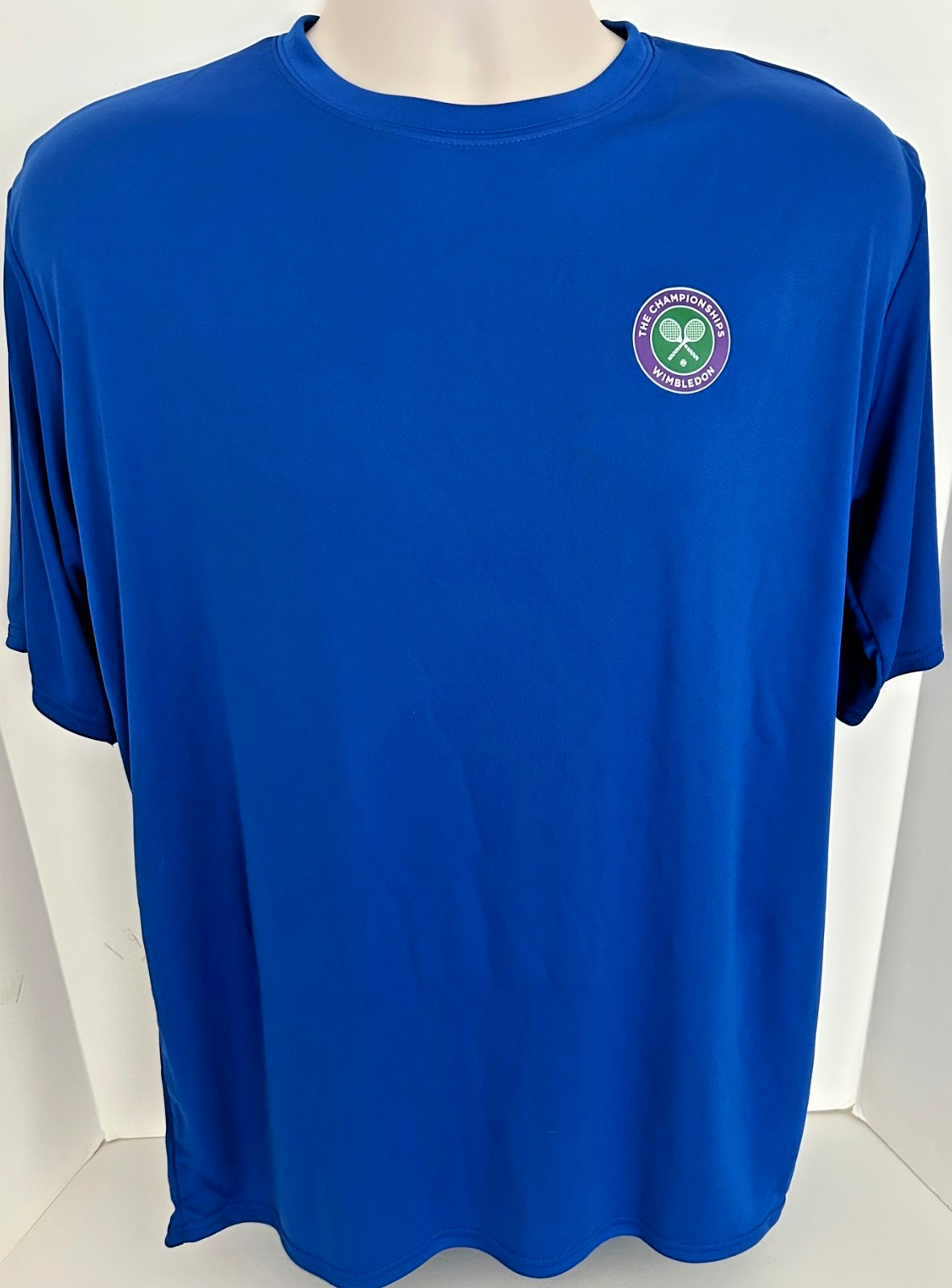 Wimbledon Logo on True Royal SS T’s UPF50 3.8-OZ, 100% Poly Dry-Fit Limited Run