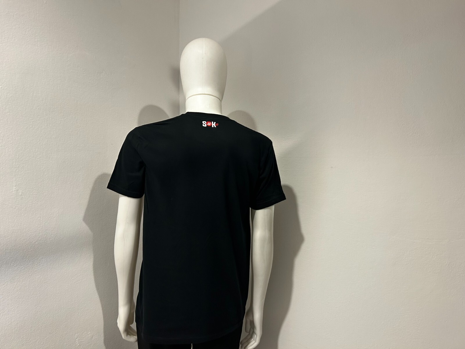Unisex Short Sleeve T-Shirt, White or Black, Brand “Suka” with Small Logos