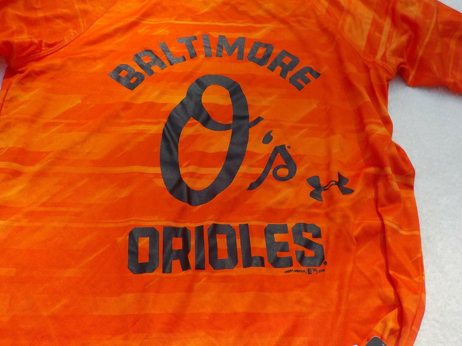 NWT Under Armour loose fit Heat Gear T, men’s S, Orioles, Anti Odor, $45, orange