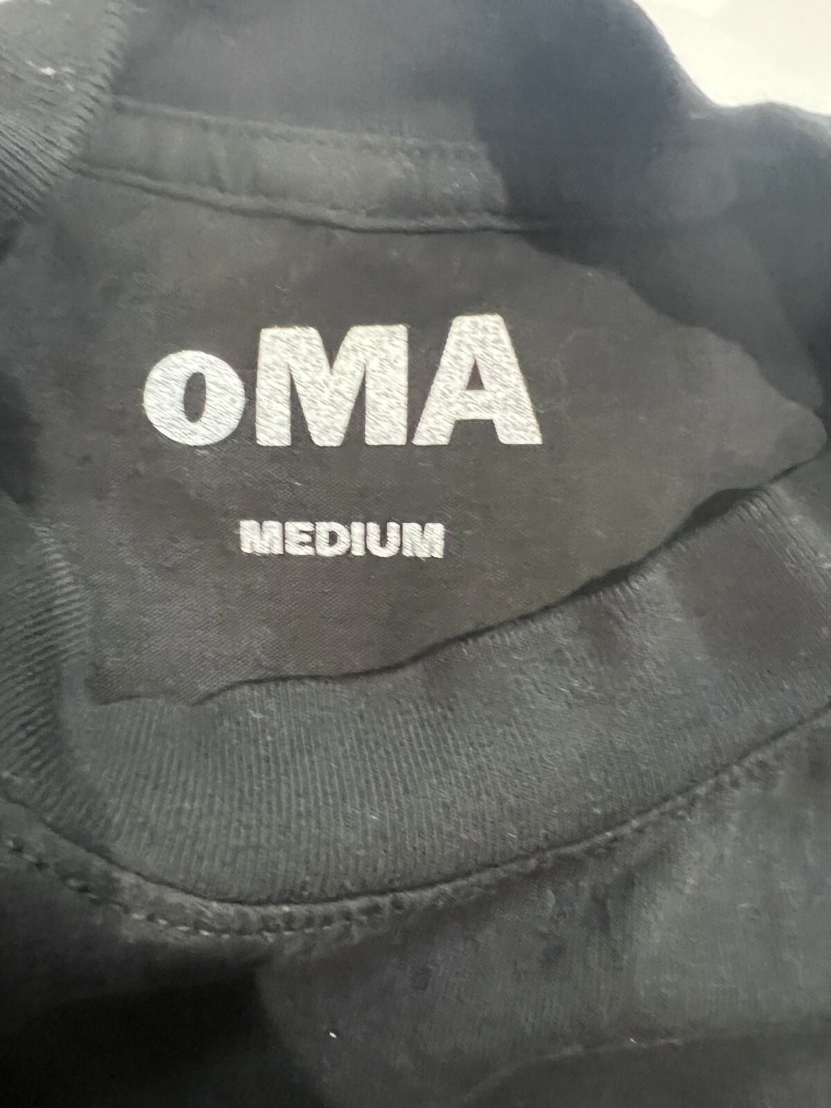 oMA Design Studio T-Shirt in Black