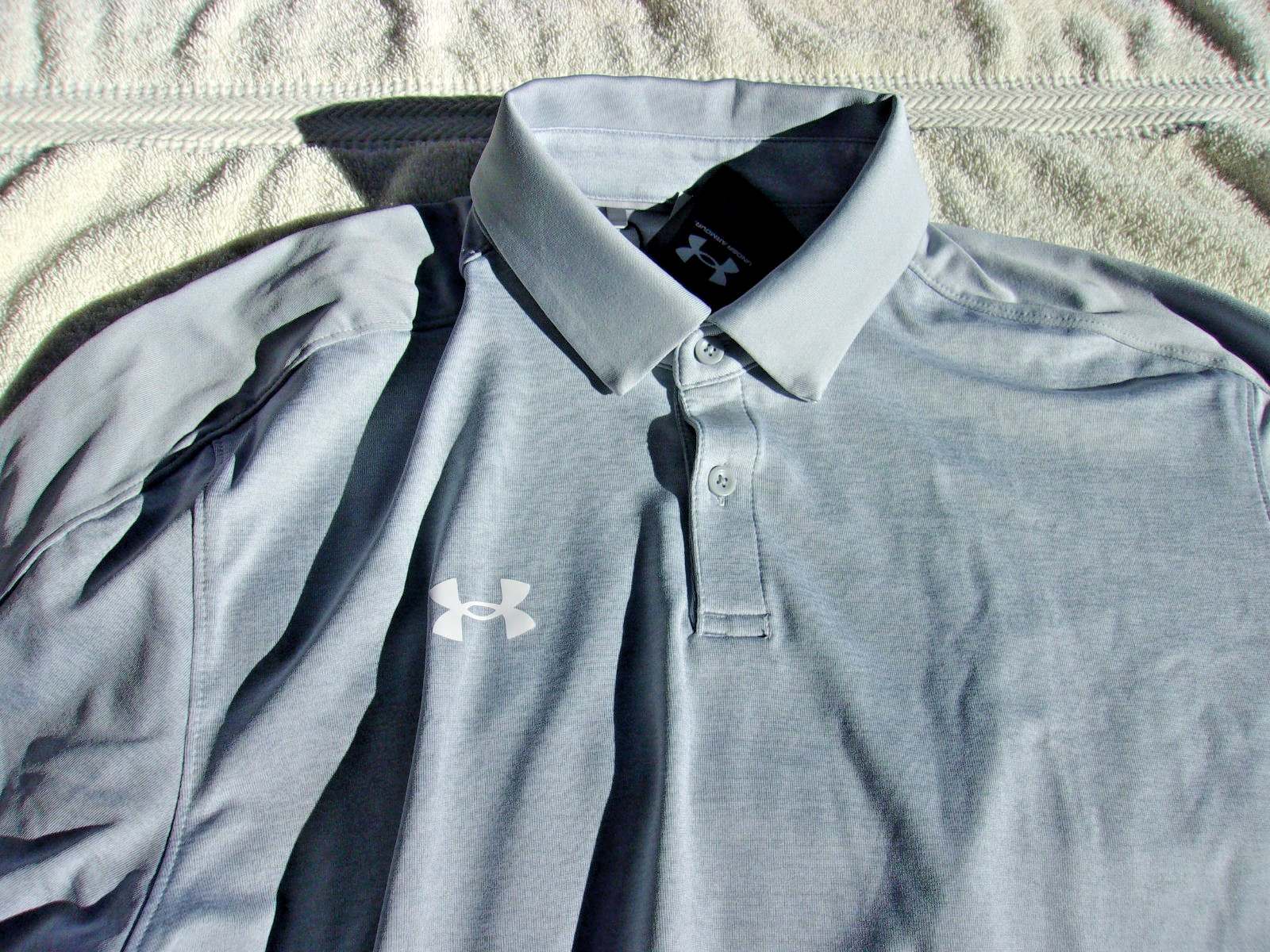 NWT Under Armour Loose Fit Trophy polo, men’s LT, XL, heather gray, poly.