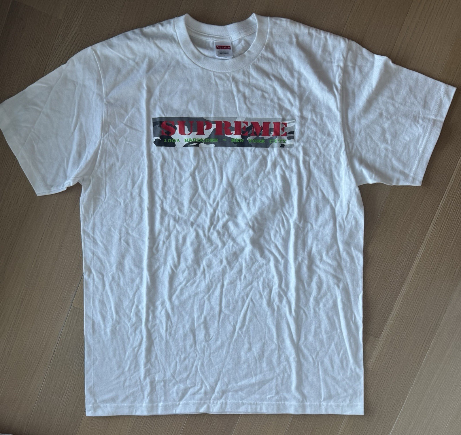 Classic Supreme “100% Hardcore” Box Logo Tee in white featuring the camouflage