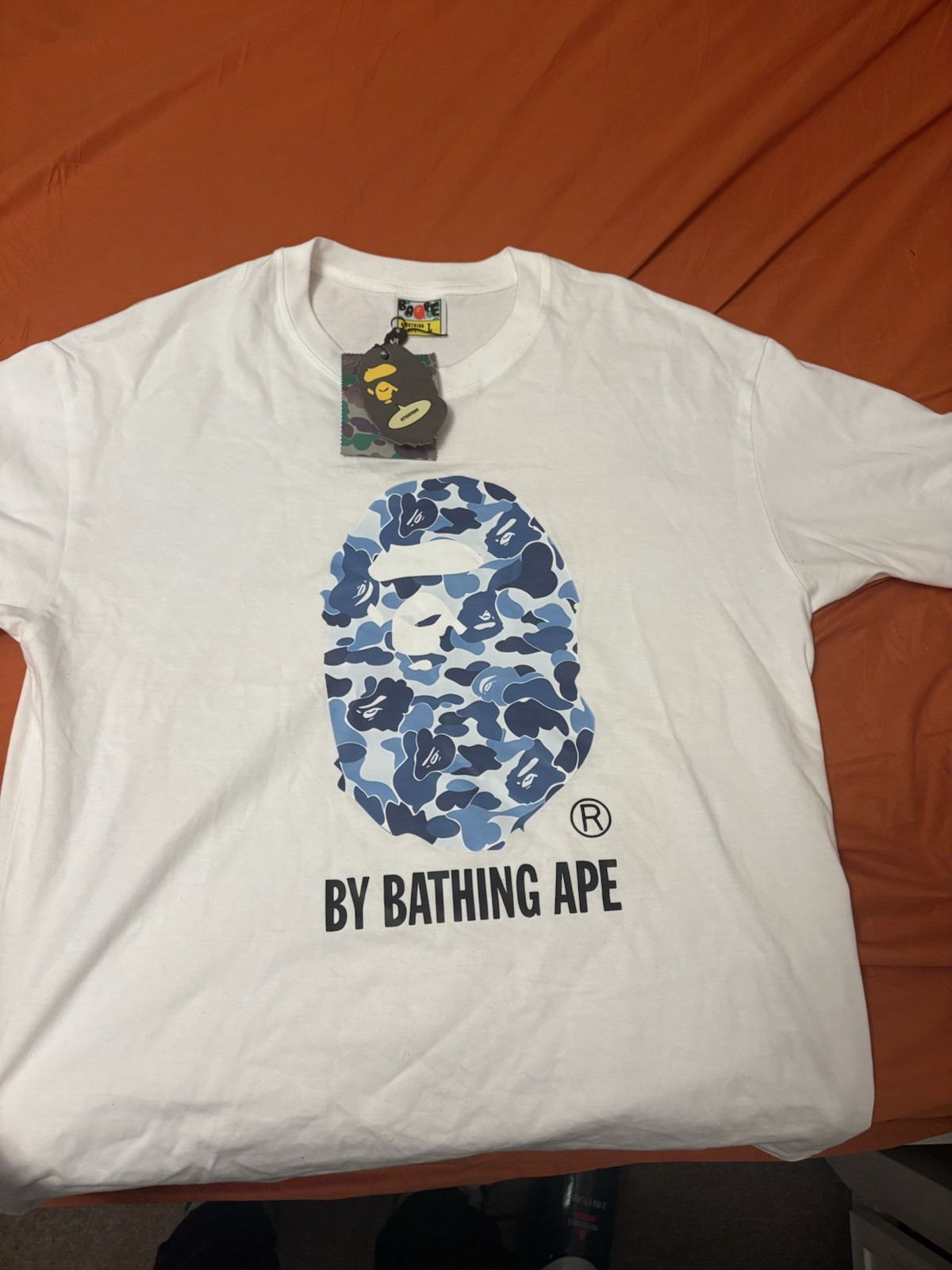 BAPE white t-shirt with blue camouflage ape head graphic