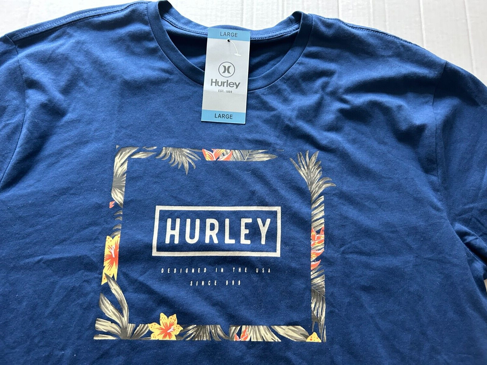 HURLEY SIZE LARGE DARK BLUE SHORT SLEEVE T-SHIRT…SEE DESCRIPTION