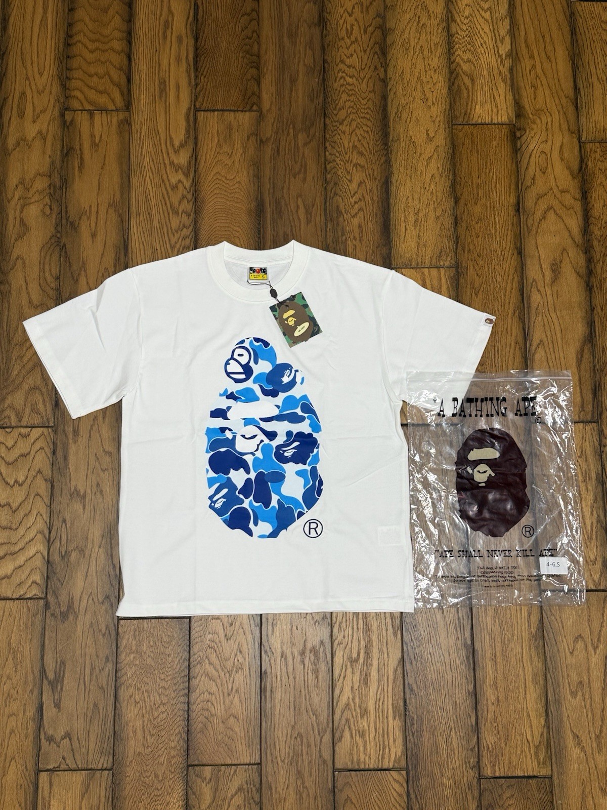 A Bathing Ape BAPE Men’s White Crew Neck Short Sleeve Graphic Logo T-Shirt (S)