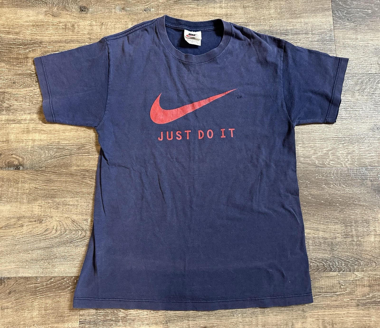 Vintage Nike T Shirt Mens S Blue Center Swoosh Logo Distressed Sun Faded USA