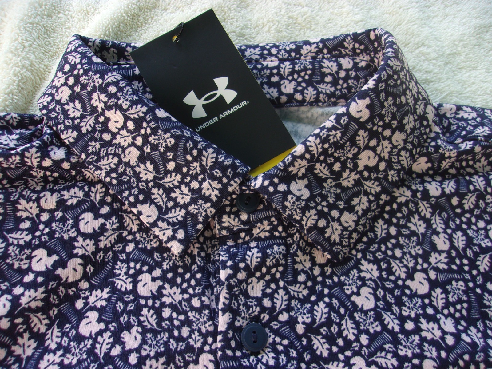 NWT Under Armour Loose Fit golf polo, men’s L, blue, pink squirrels, poly., $70