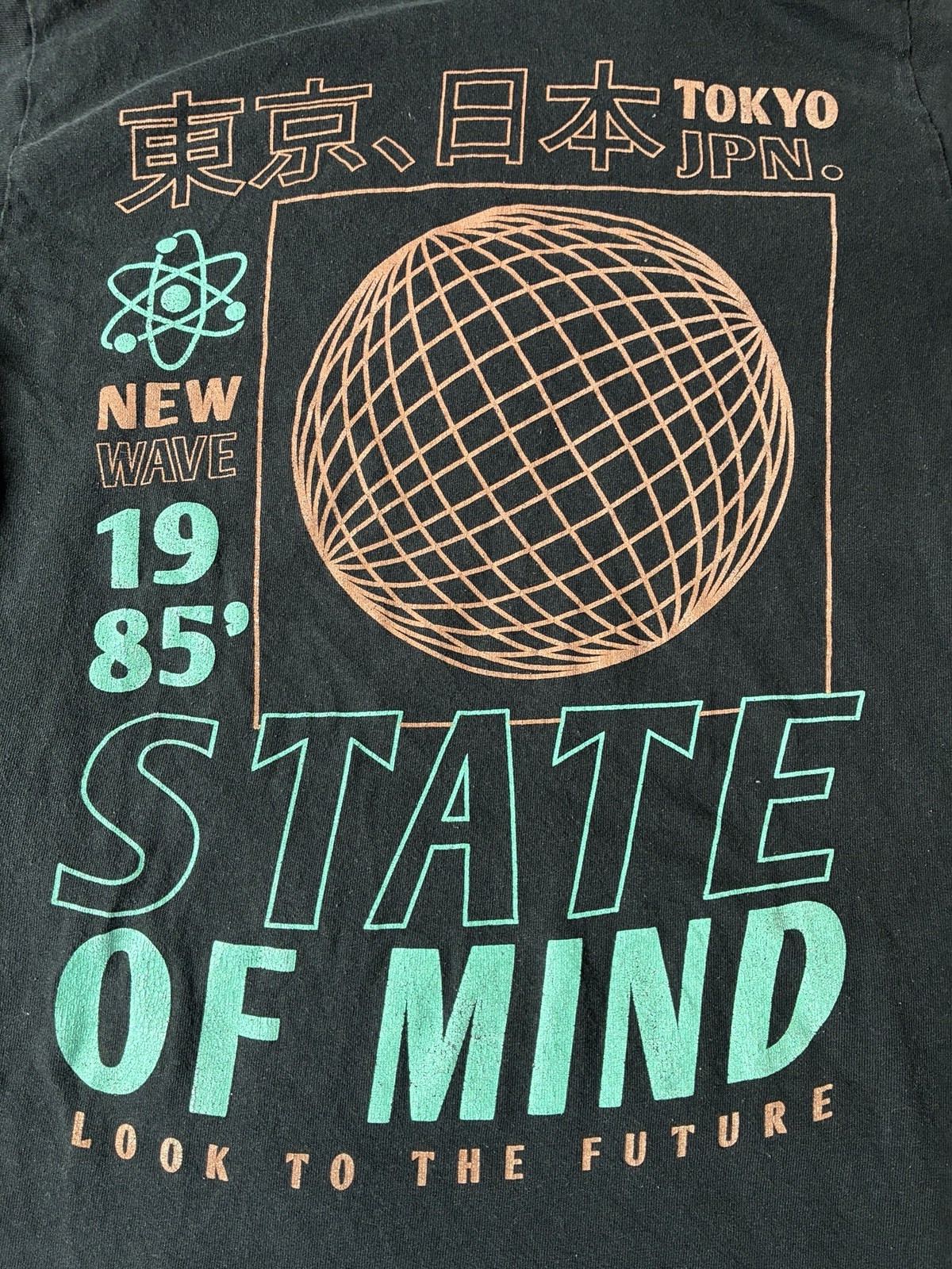 black T-shirt from New Look features a small “Tokyo Japan”