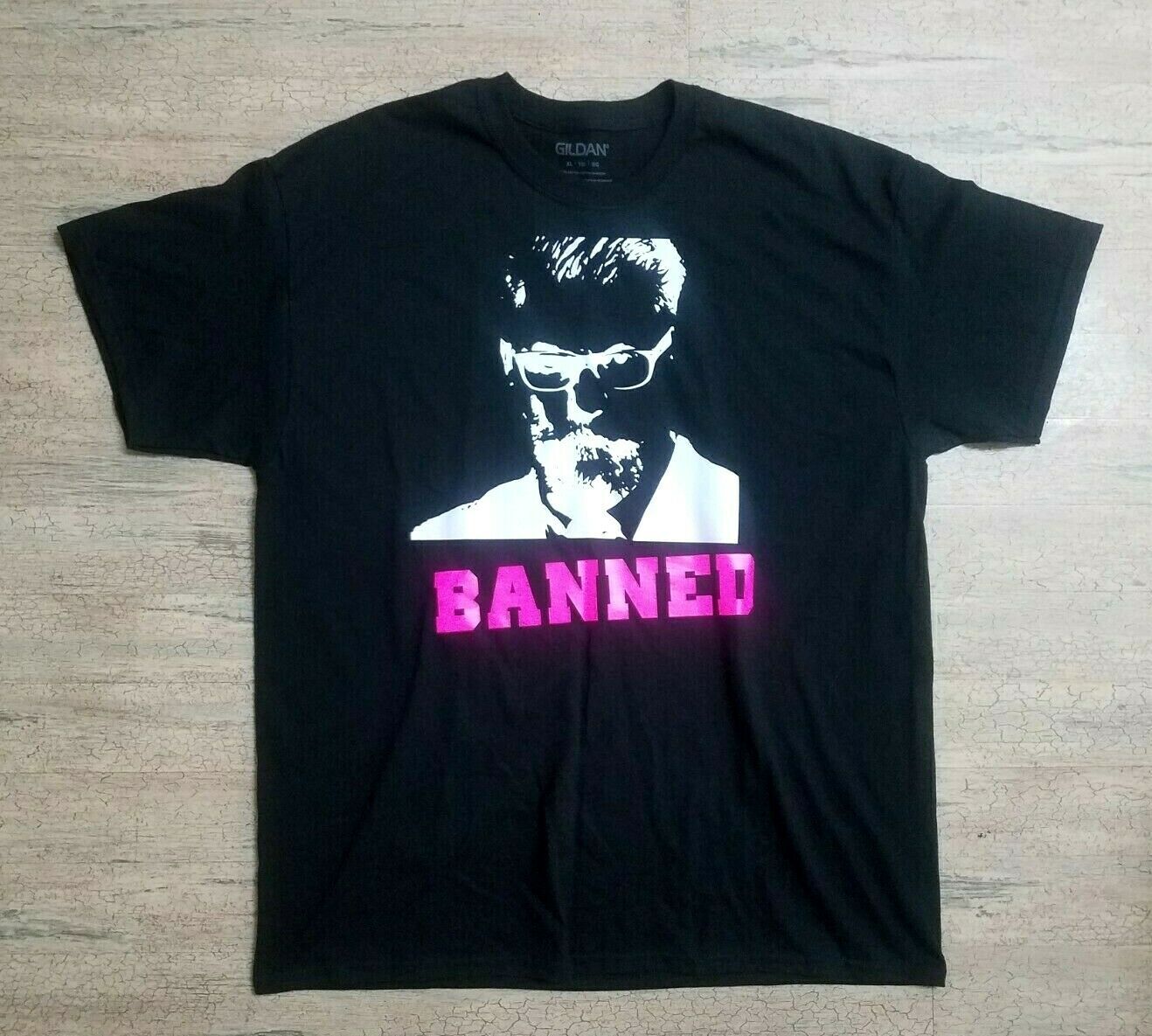 Banned Galvin Mcinnes T-Shirt Size XL Black with Pink Writing. Quote on back.
