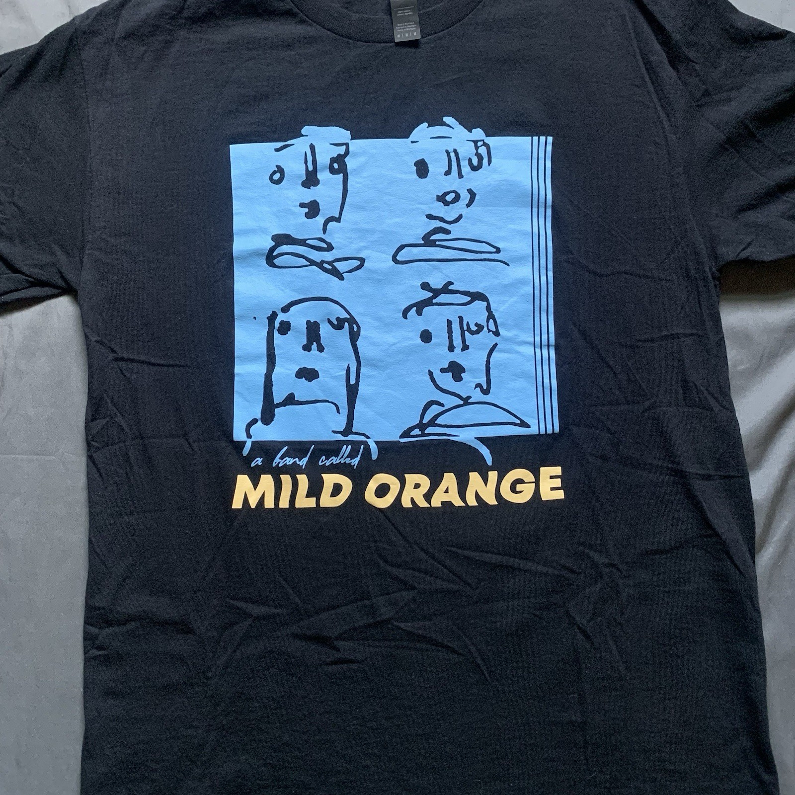 A Band Called Mild Orange The OG Faces Black T-Shirt Adult Size Medium 20×25.5