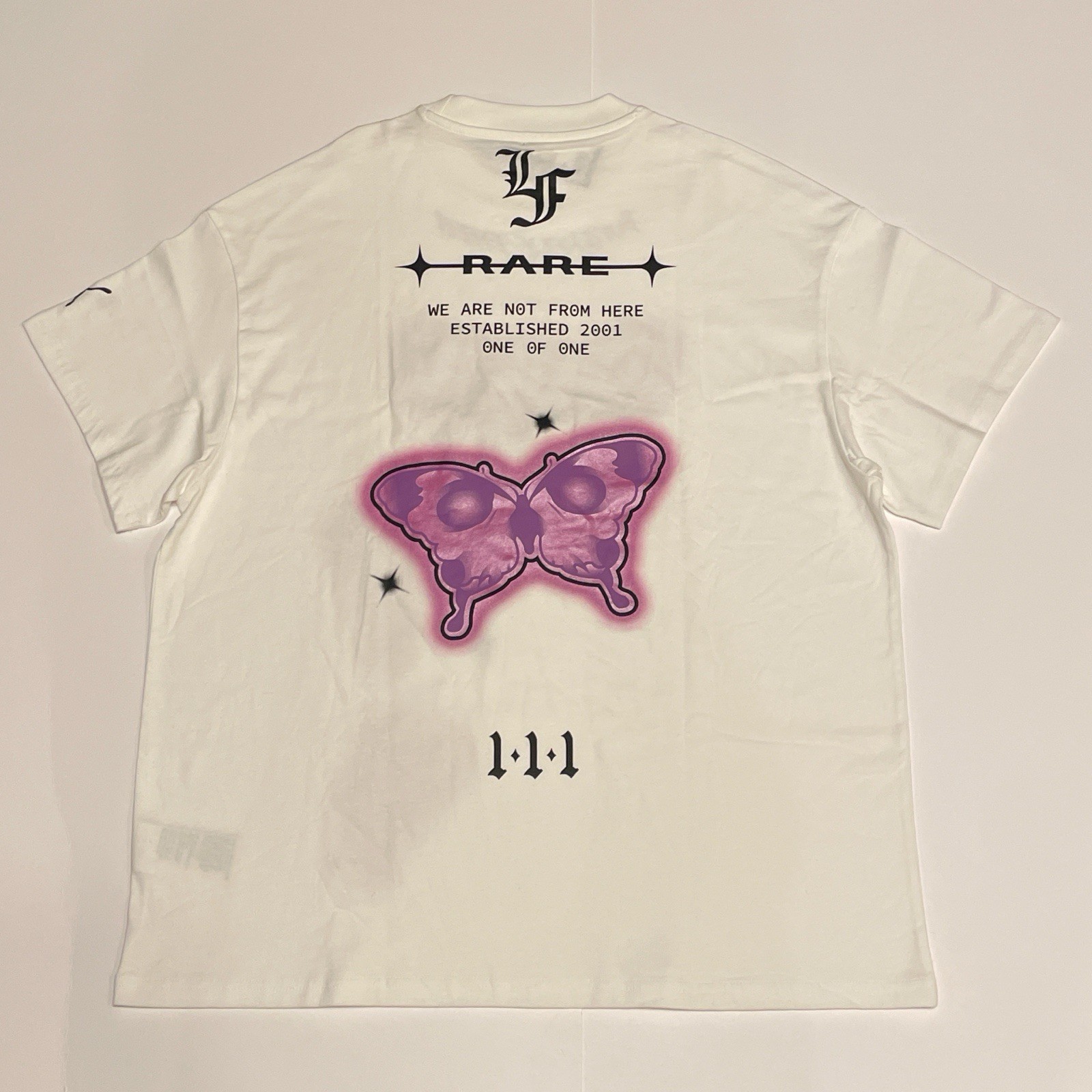 PUMA X LAMELO BALL LA FRANCE BUTTERFLY EFFECT OVERSIZED T SHIRT (MEDIUM)