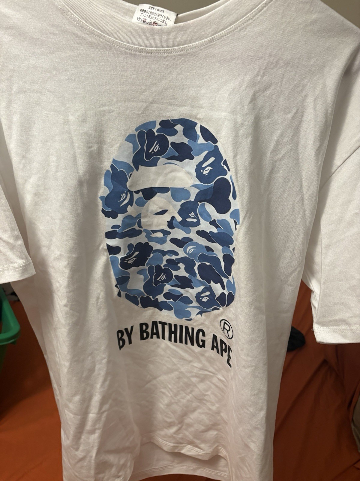 BAPE white t-shirt with blue camouflage ape head graphic