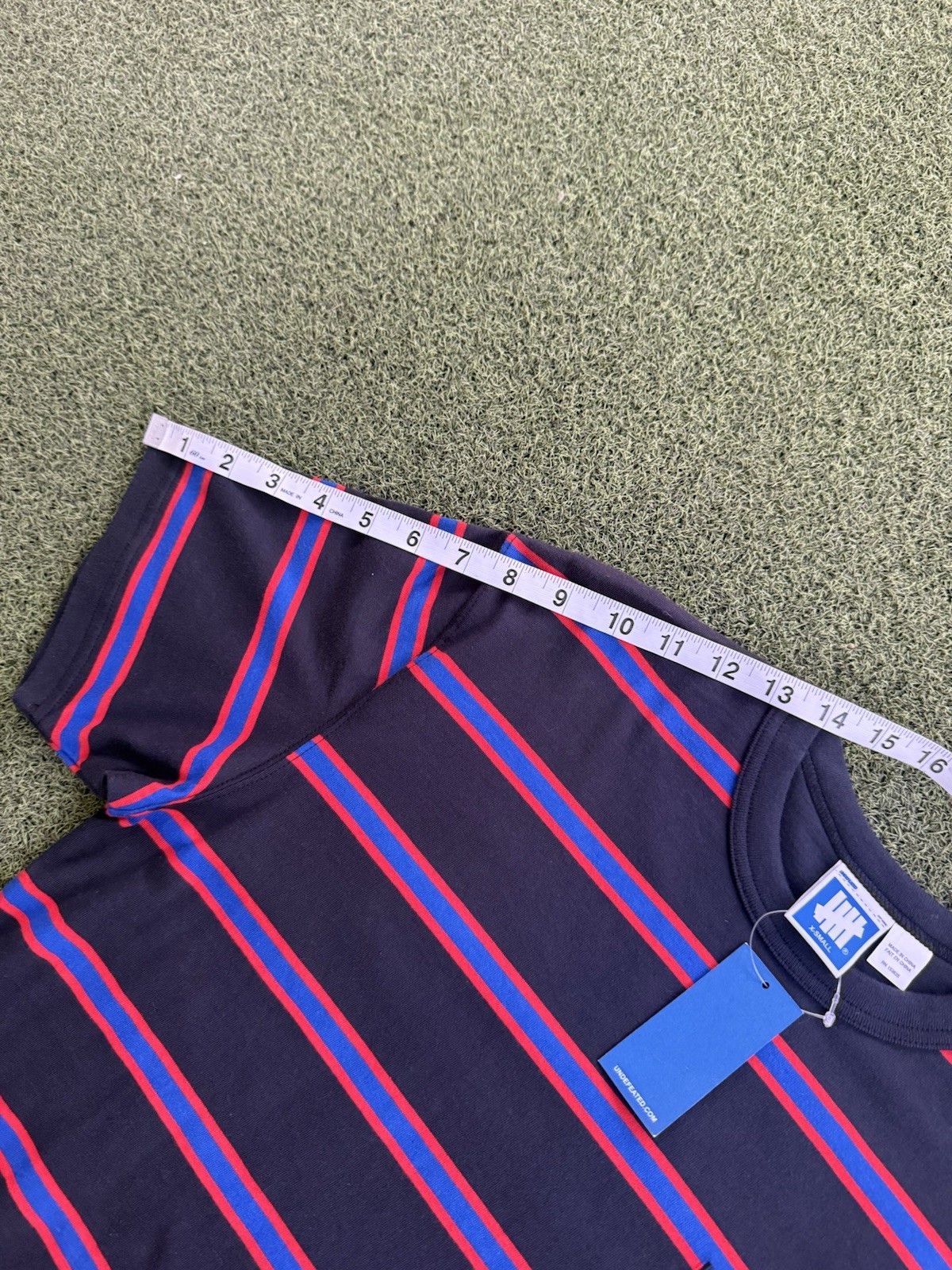 MODERN DESIGNER LUXURY PINSTRIPED SKATER STREETWEAR UNDEFEATED Y2K TEE