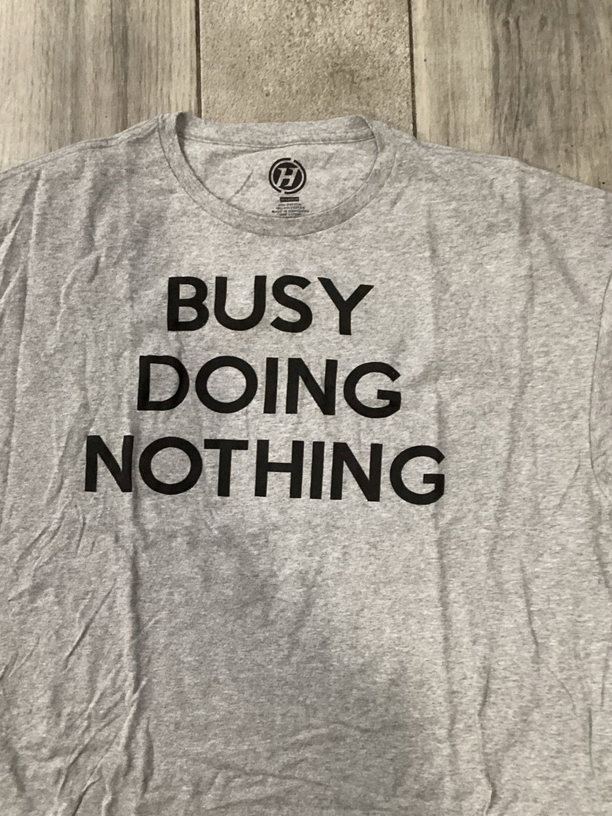 Source Unknown Light Gray Graphic Tee with Black Text – ‘Busy Doing Nothing’