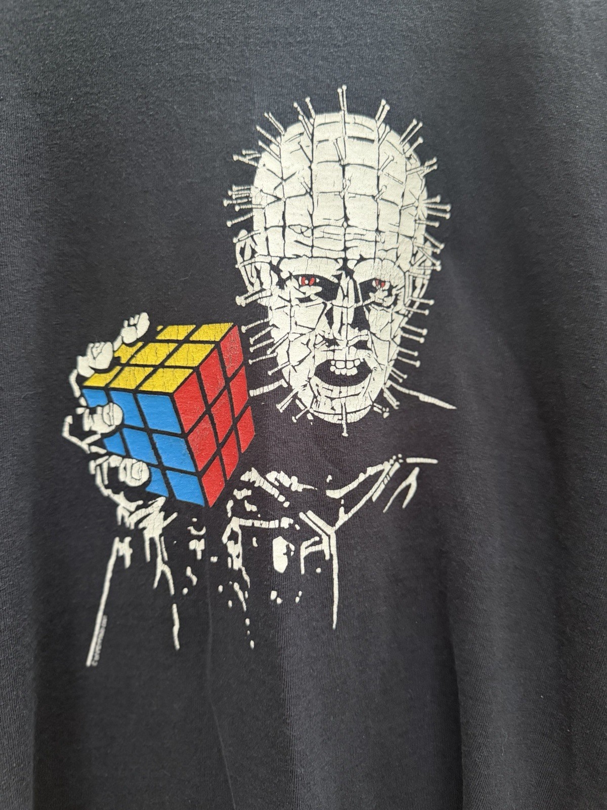 Hellraiser Pinhead Holding Rubik’s Cube Graphic T-Shirt