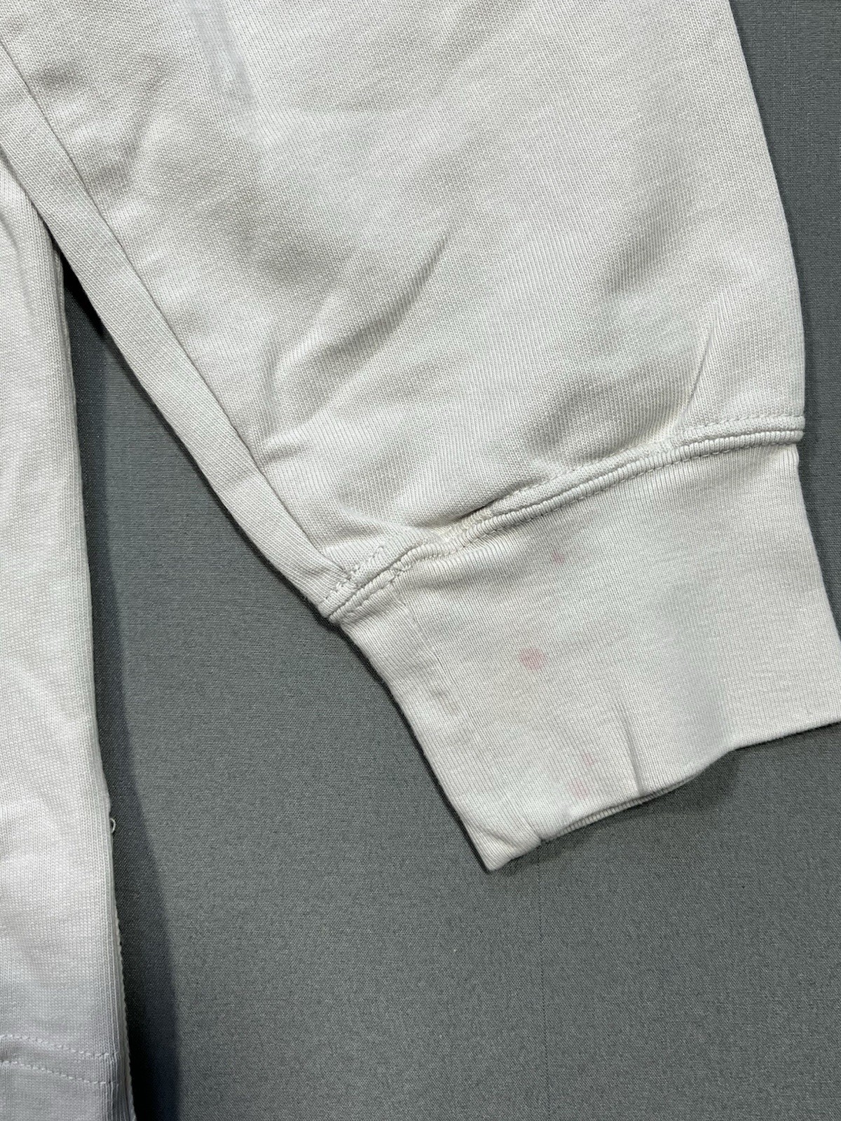 Nike long sleeve mock neck top in Light Bone featuring a small swoosh logo