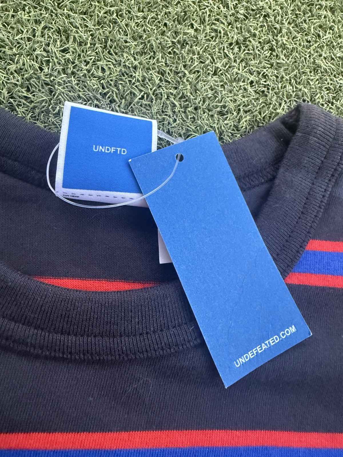 MODERN DESIGNER LUXURY PINSTRIPED SKATER STREETWEAR UNDEFEATED Y2K TEE