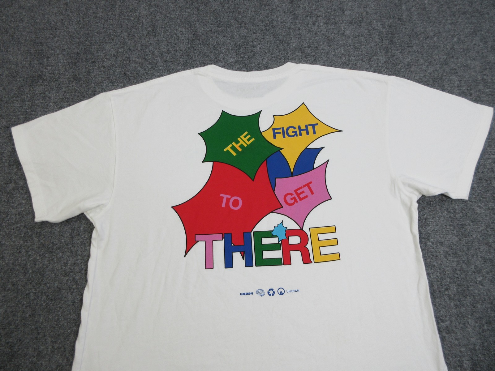 UNKNWN Shirt Mens Large White Smile Graphic Tee The Fight To Get There USA